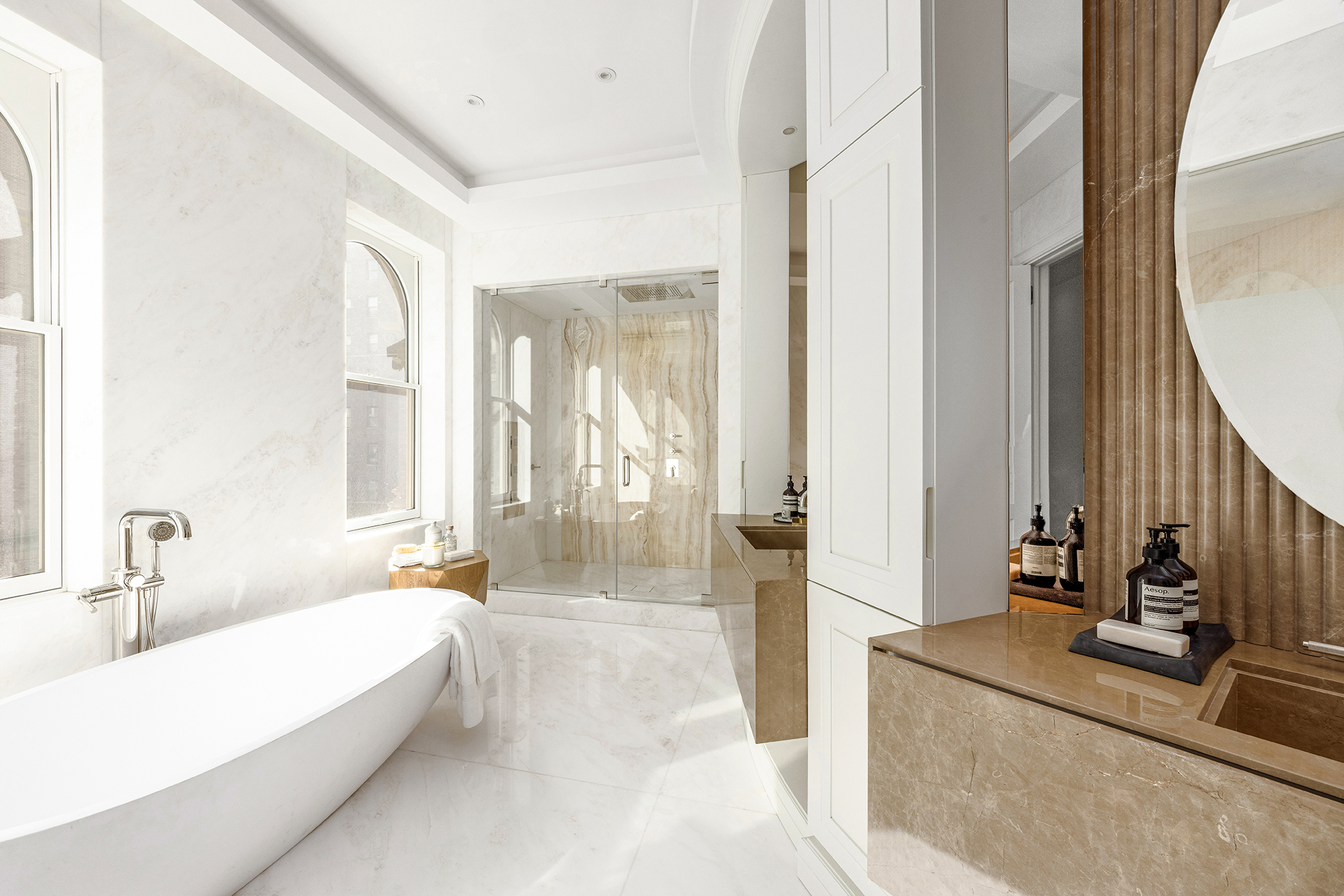 133 East 73rd Street, Unit PH Manhattan, NY 10021 - Photo 14 of 37 a spacious bathroom with sink and mirror with bathtub