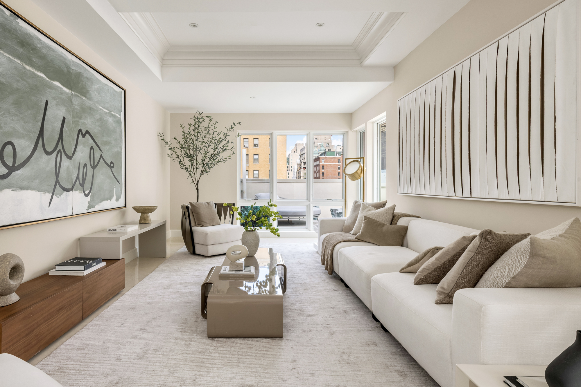 133 East 73rd Street, Unit PH Manhattan, NY 10021 - Photo 22 of 37 a living room with furniture and a large window