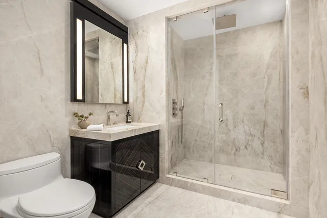 a bedroom with bed and window