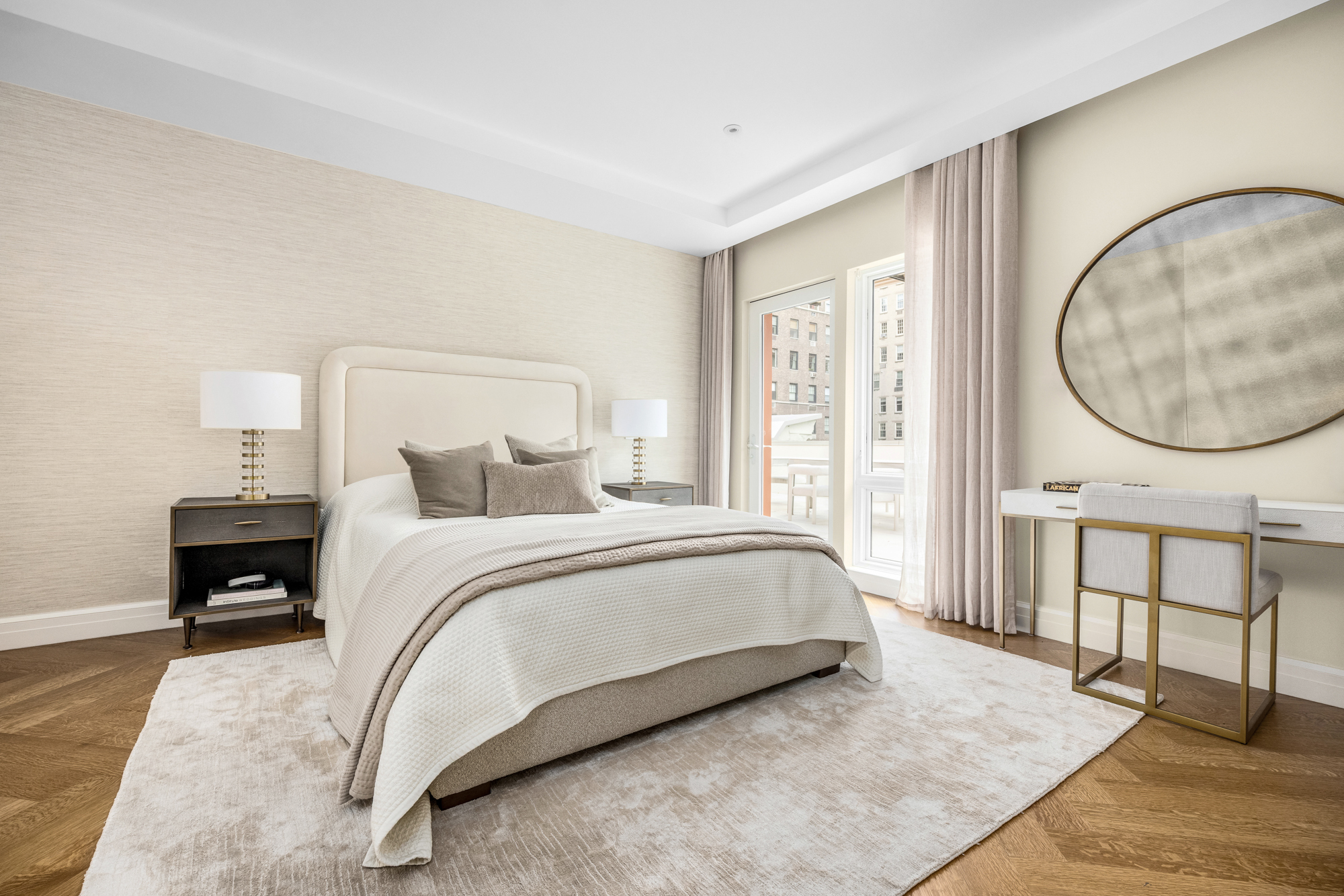 133 East 73rd Street, Unit PH Manhattan, NY 10021 - Photo 32 of 37 a spacious bedroom with a bed a mirror and a table