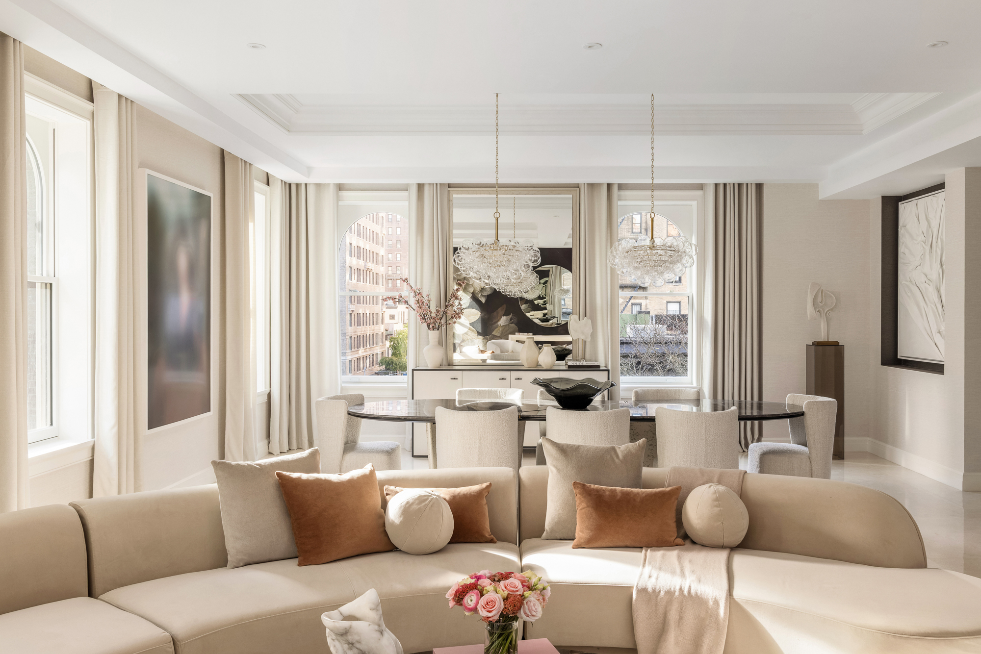 133 East 73rd Street, Unit PH Manhattan, NY 10021 - Photo 4 of 37 a living room with furniture and a large window