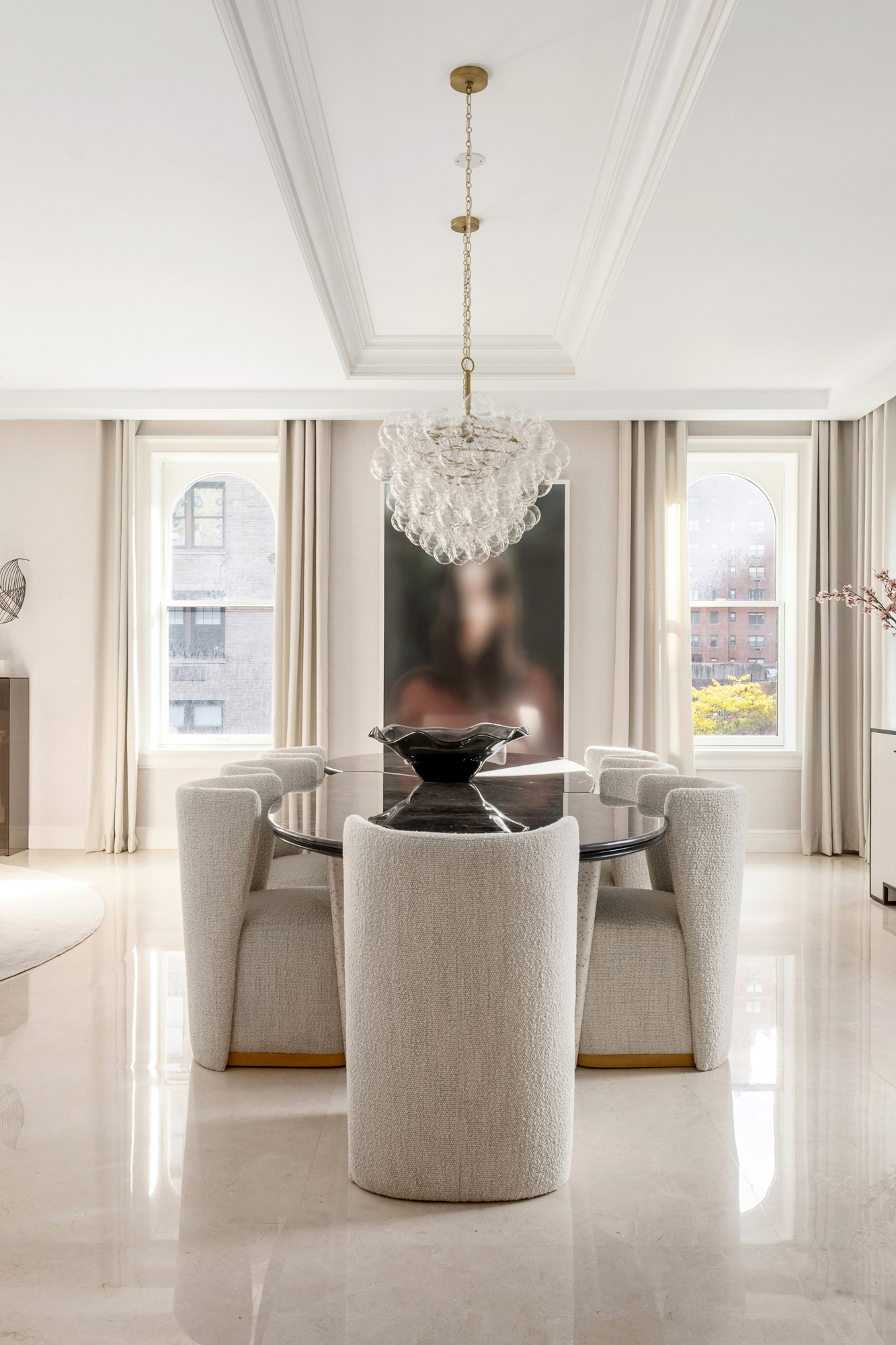 133 East 73rd Street, Unit PH Manhattan, NY 10021 - Photo 5 of 37 a living room with furniture and a flat screen tv