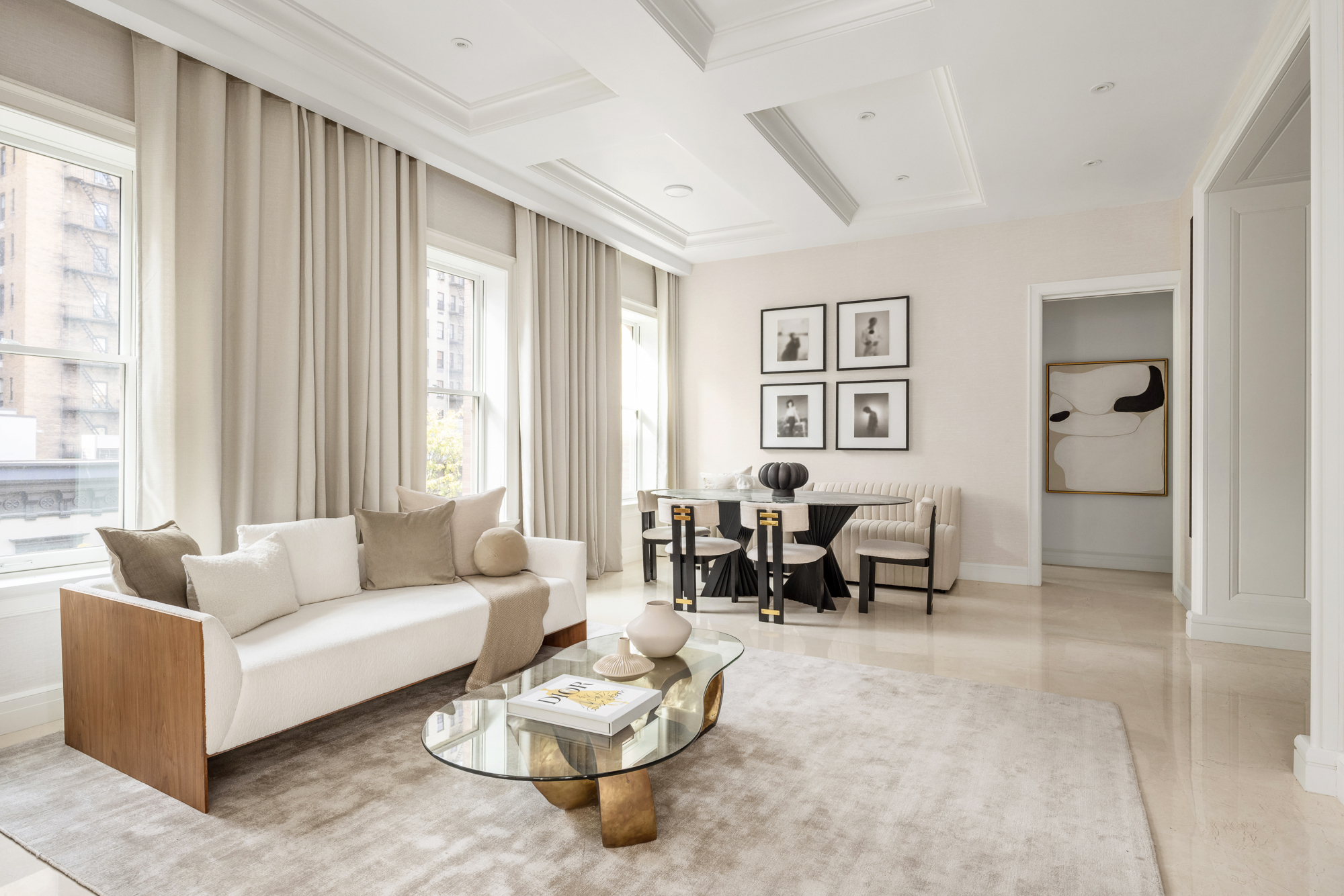 133 East 73rd Street, Unit PH Manhattan, NY 10021 - Photo 6 of 37 a living room with furniture and a large window