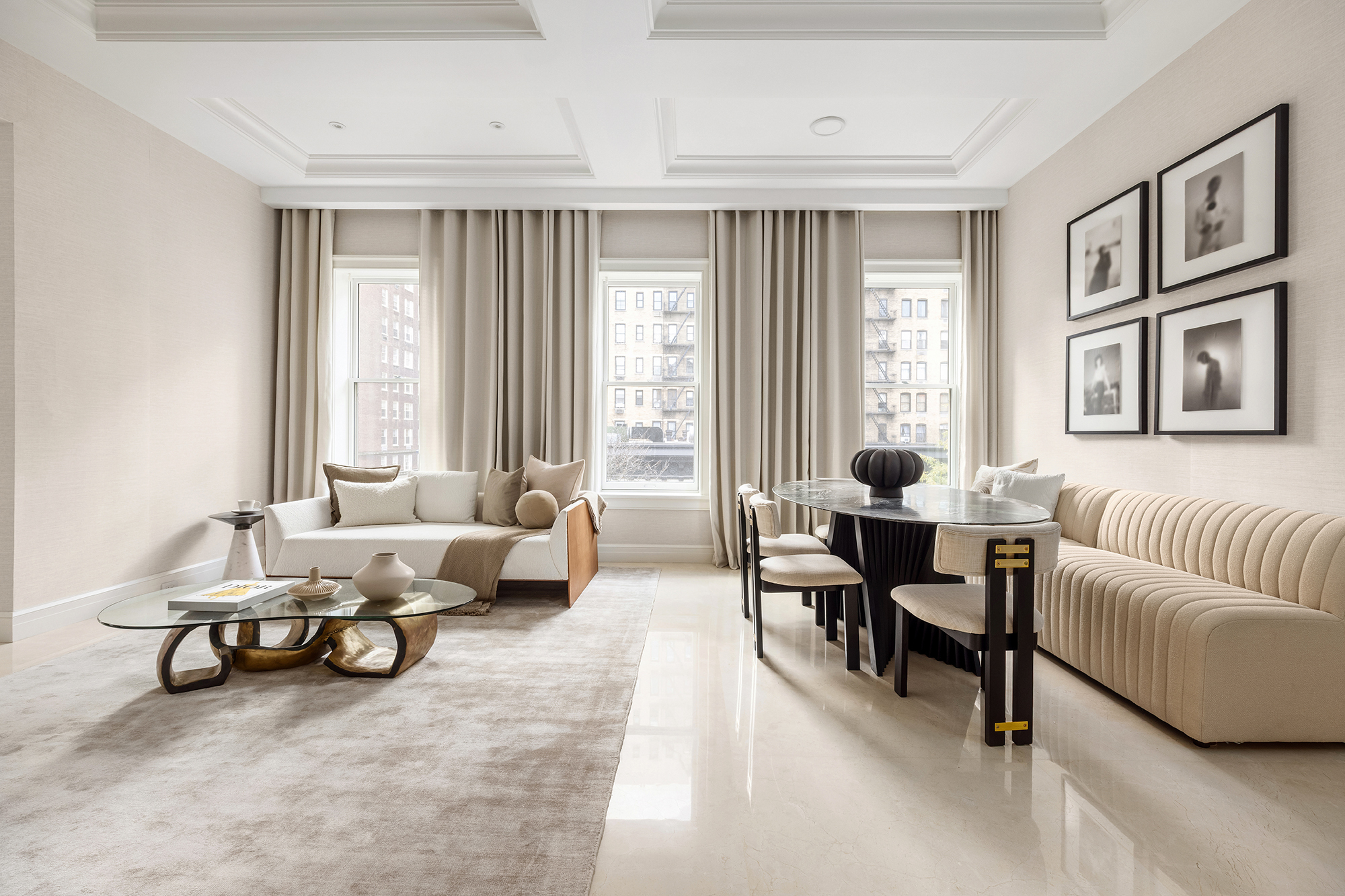 133 East 73rd Street, Unit PH Manhattan, NY 10021 - Photo 7 of 37 a living room with furniture and a large window