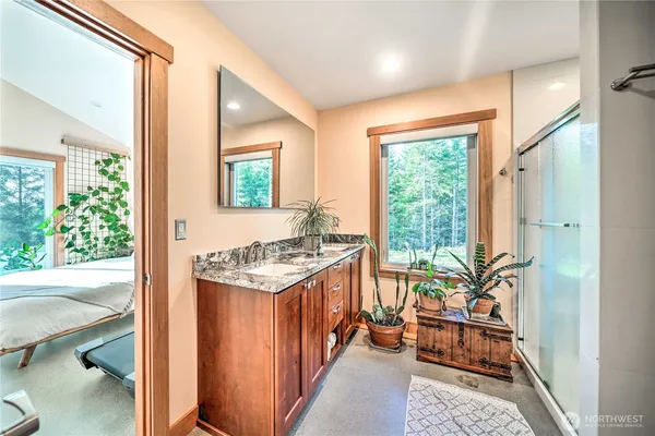 a kitchen with stainless steel appliances granite countertop a stove and a refrigerator