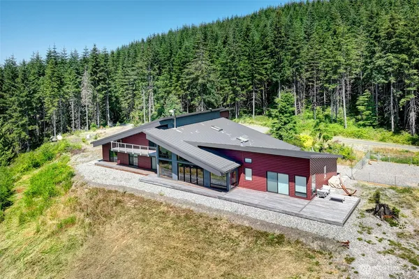 a view of a house with a small yard