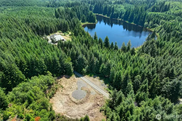 a view of a lake with a park
