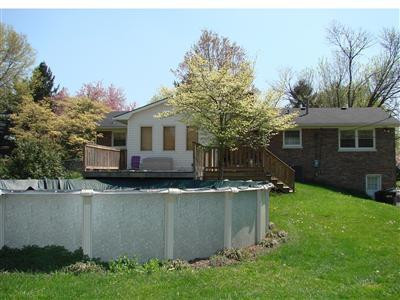 106 Bayberry Road Versailles, KY 40383 - Photo 5 of 19 Backyard with deck and above ground pool