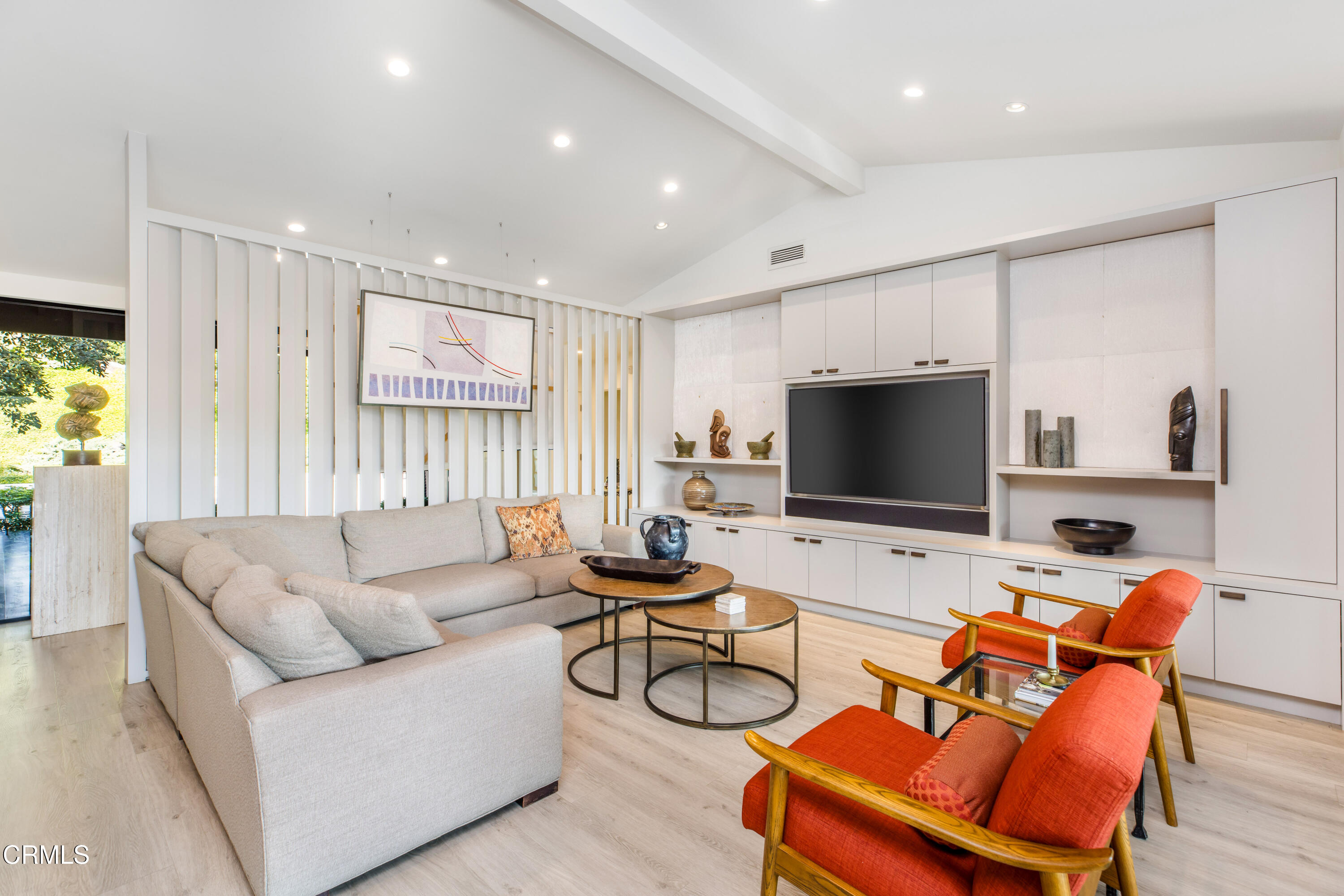 1240 Chateau Road Pasadena, CA 91105 - Photo 16 of 45 a living room with furniture and a flat screen tv