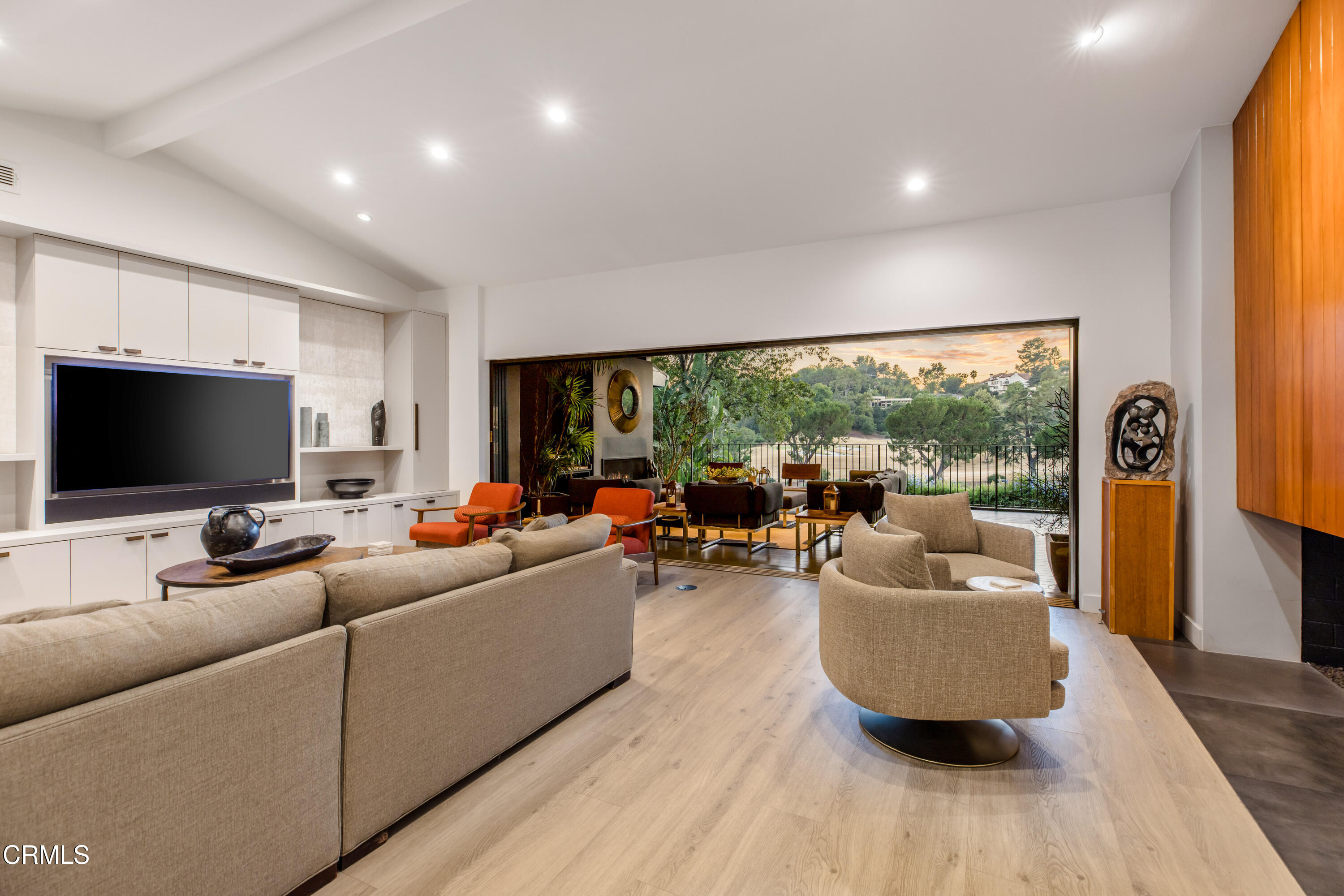 1240 Chateau Road Pasadena, CA 91105 - Photo 8 of 45 a living room with furniture and a flat screen tv