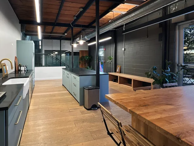 a lobby with furniture and window