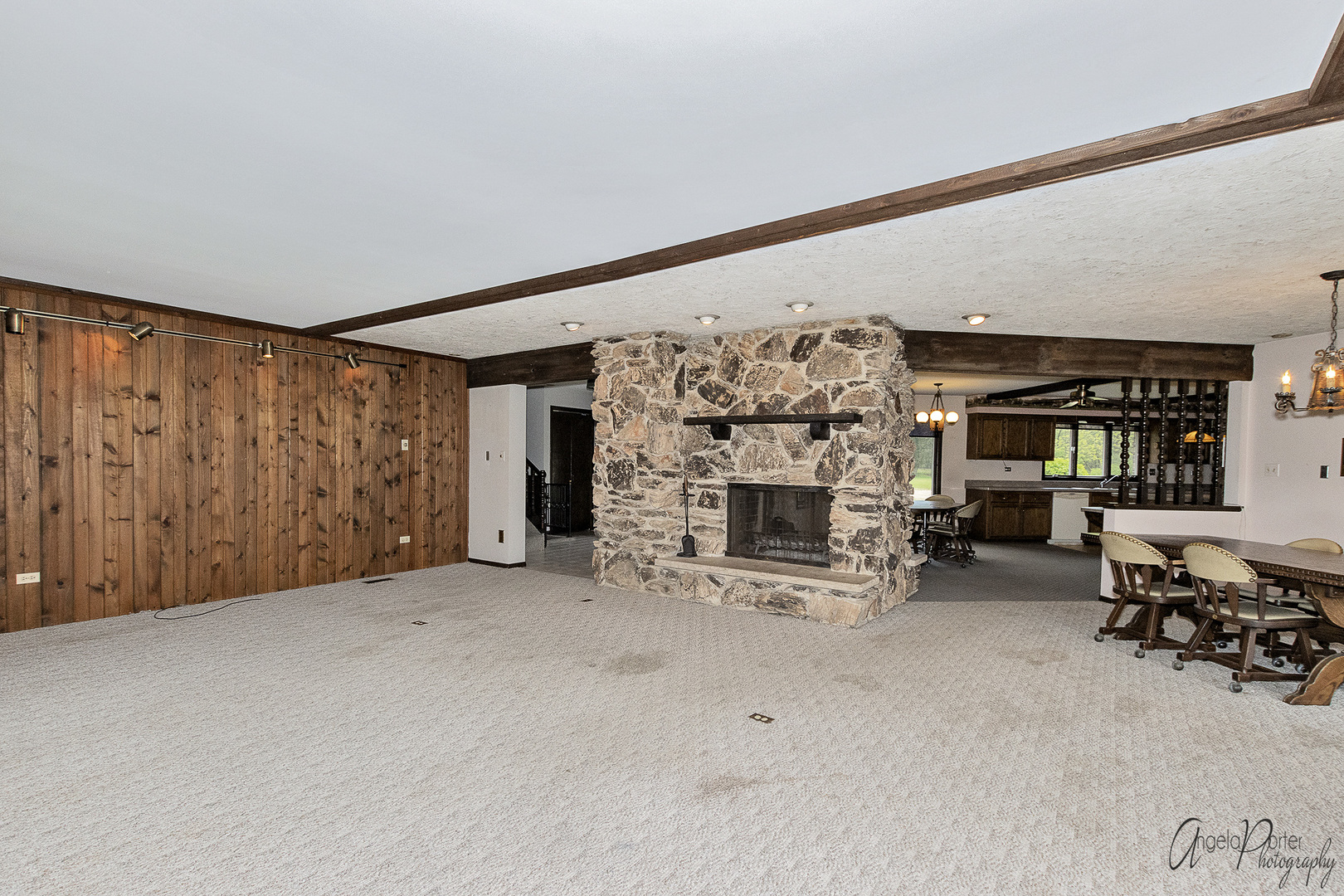9920 Voss Road Marengo, IL 60152 - Photo 13 of 41 an empty room with furniture and a fireplace