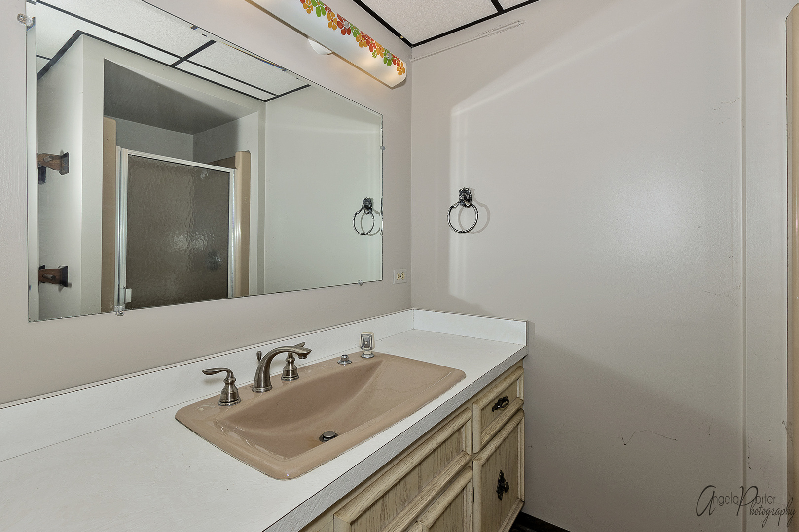 9920 Voss Road Marengo, IL 60152 - Photo 32 of 41 a bathroom with a sink and a mirror