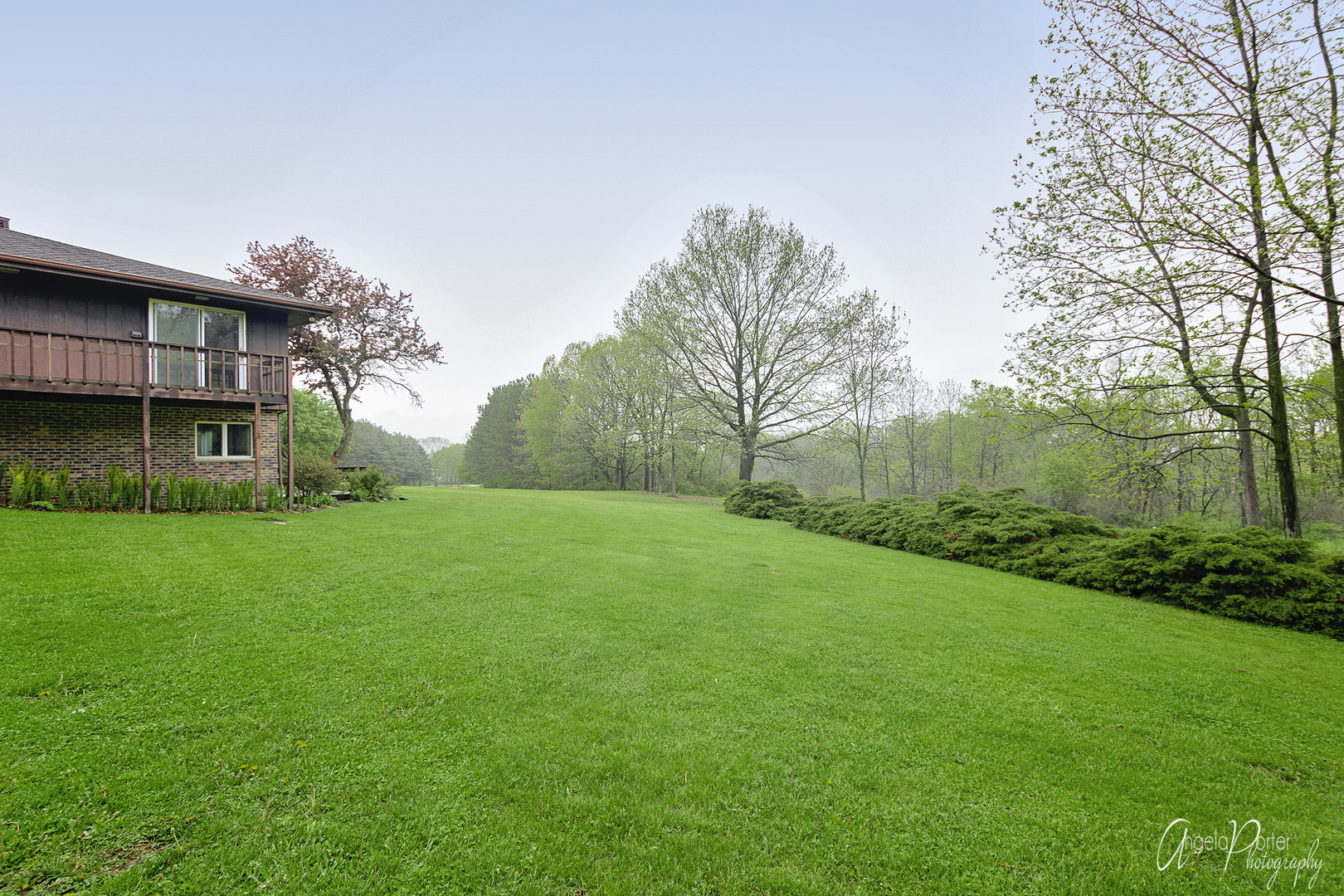 9920 Voss Road Marengo, IL 60152 - Photo 37 of 41 a view of a house with a backyard