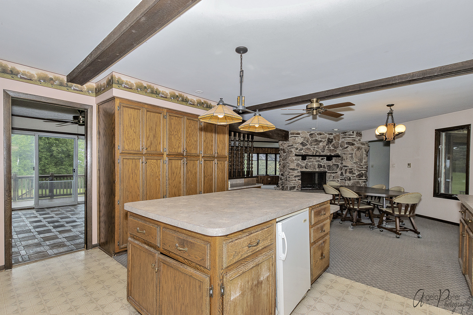 9920 Voss Road Marengo, IL 60152 - Photo 7 of 41 a kitchen that has a lot of cabinets in it
