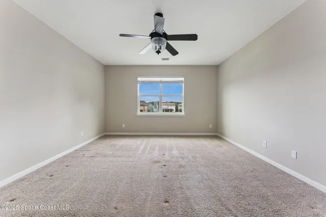 a view of a yard and city view