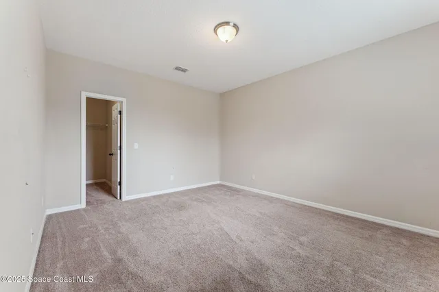 a view of a house with garden and yard