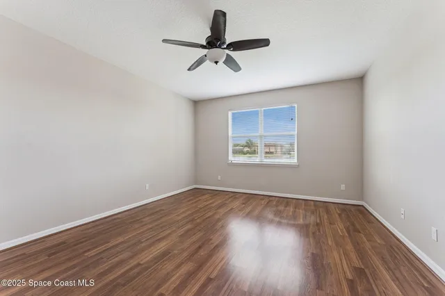 a view of a garden and basketball court