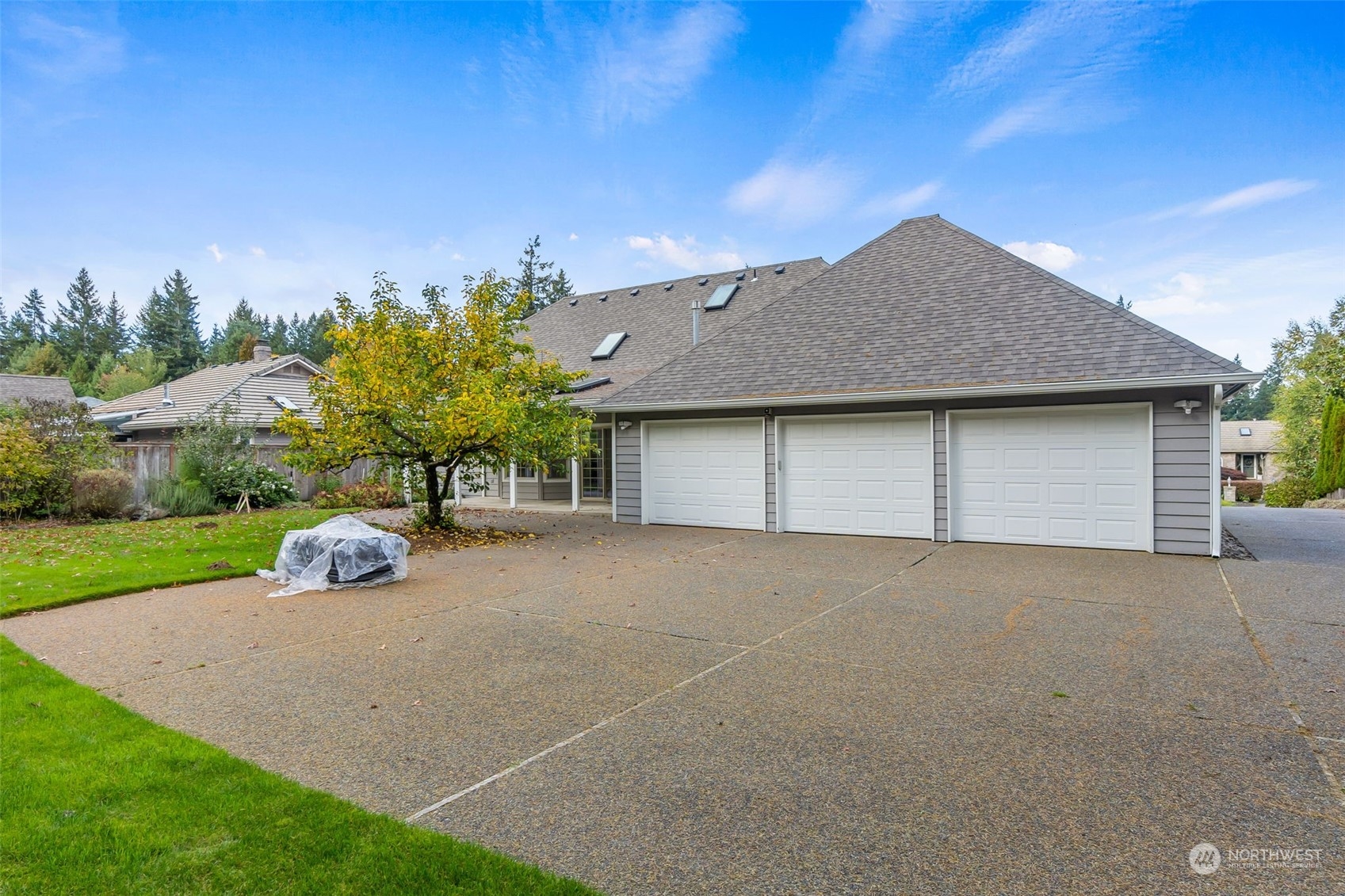 8019 68th Loop Southeast Olympia, WA 98513 - Photo 12 of 40 a house view with a garden space