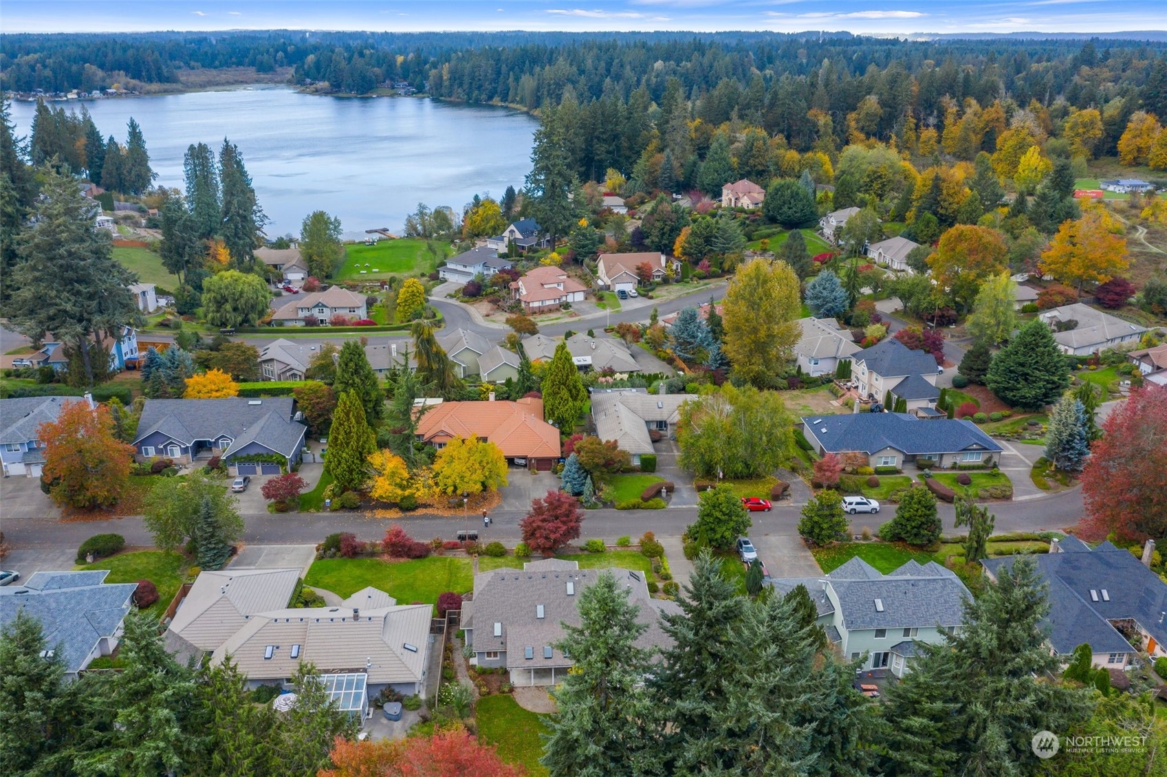 8019 68th Loop Southeast Olympia, WA 98513 - Photo 13 of 40 an aerial view of lake and residential houses with outdoor space