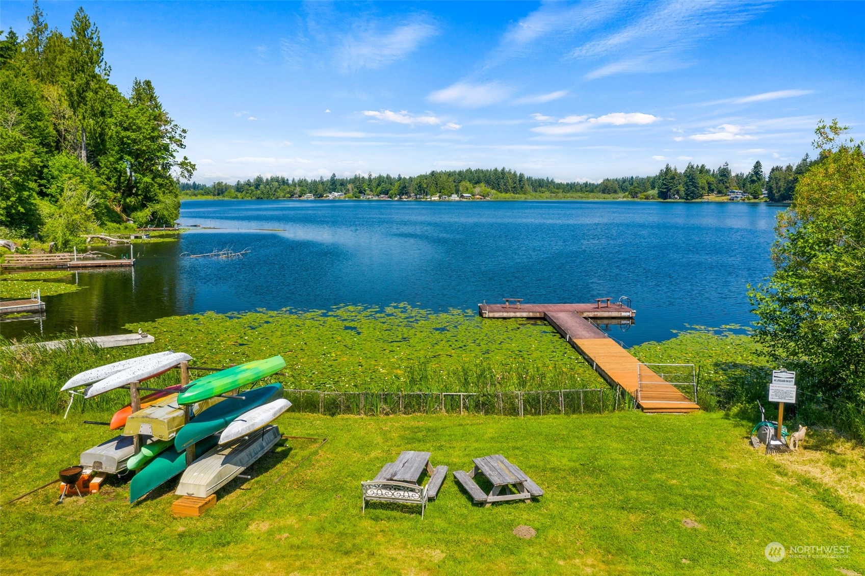 8019 68th Loop Southeast Olympia, WA 98513 - Photo 15 of 40 a view of a lake with a big yard