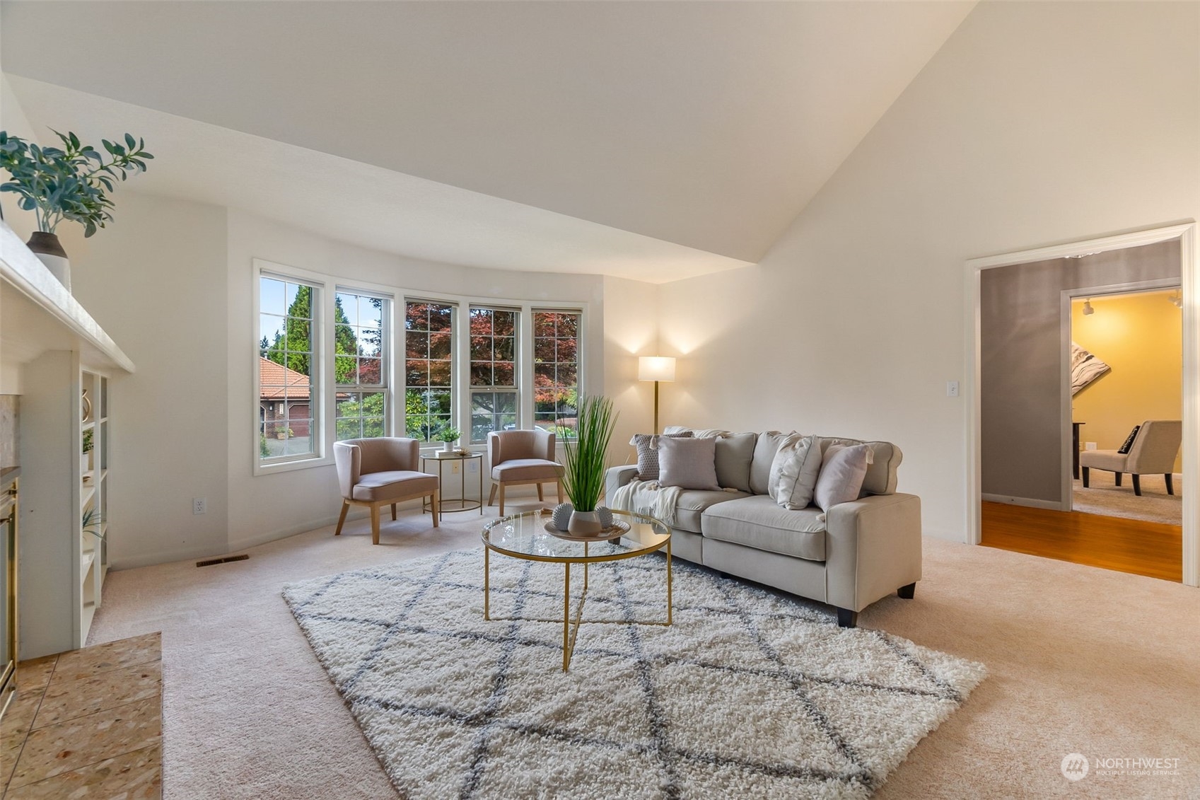 8019 68th Loop Southeast Olympia, WA 98513 - Photo 16 of 40 a living room with furniture and a large window