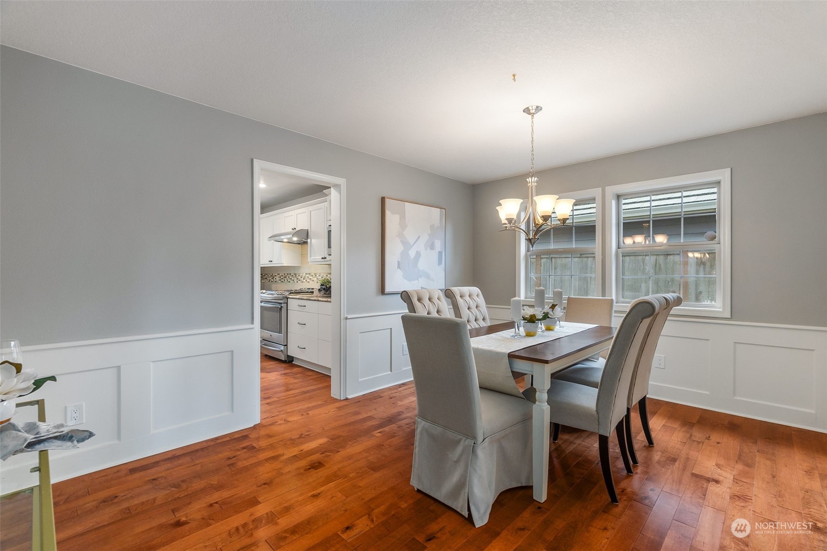 8019 68th Loop Southeast Olympia, WA 98513 - Photo 20 of 40 a view of a dining room with furniture window and wooden floor