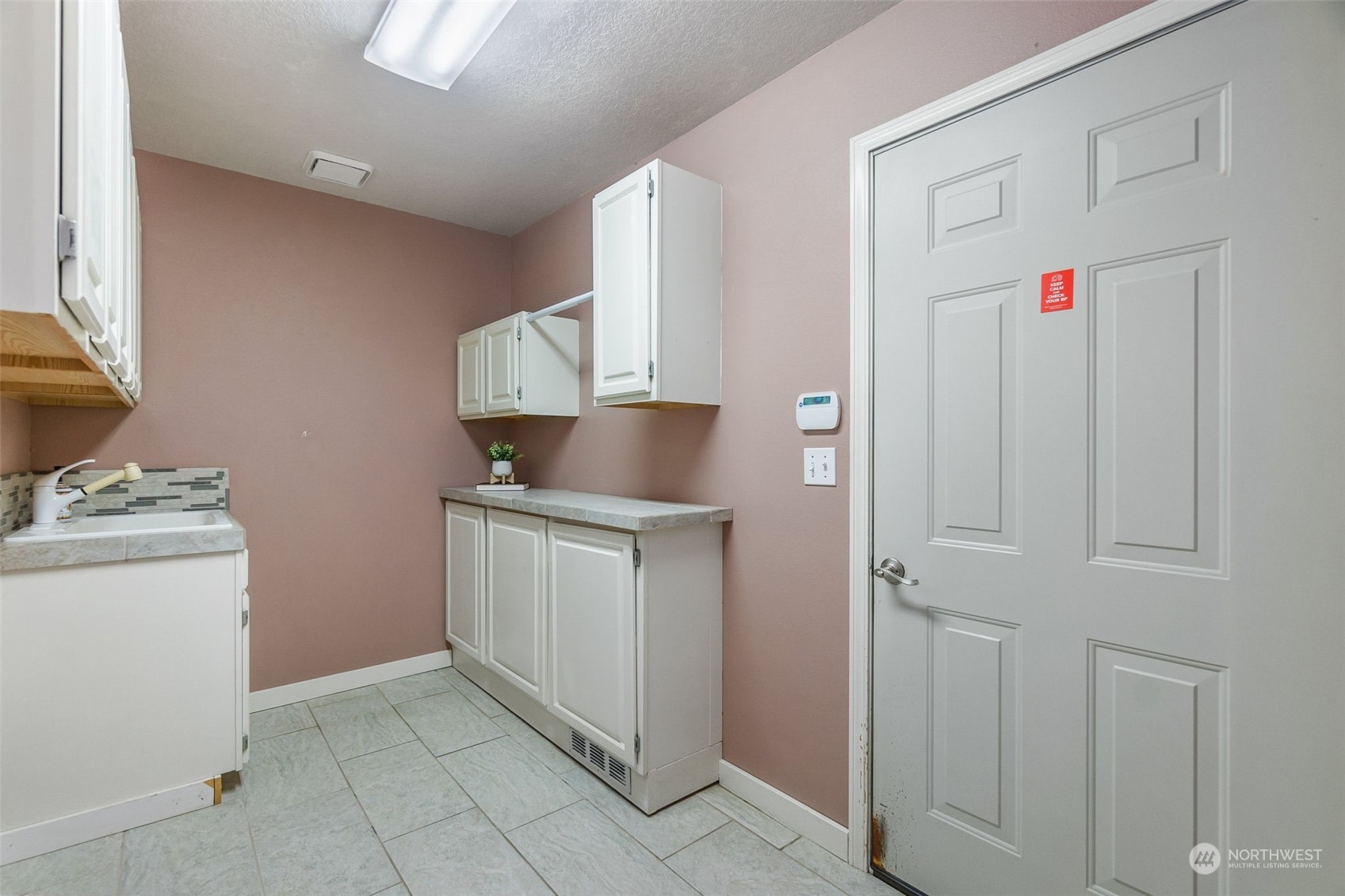 8019 68th Loop Southeast Olympia, WA 98513 - Photo 30 of 40 a room with storage and utility