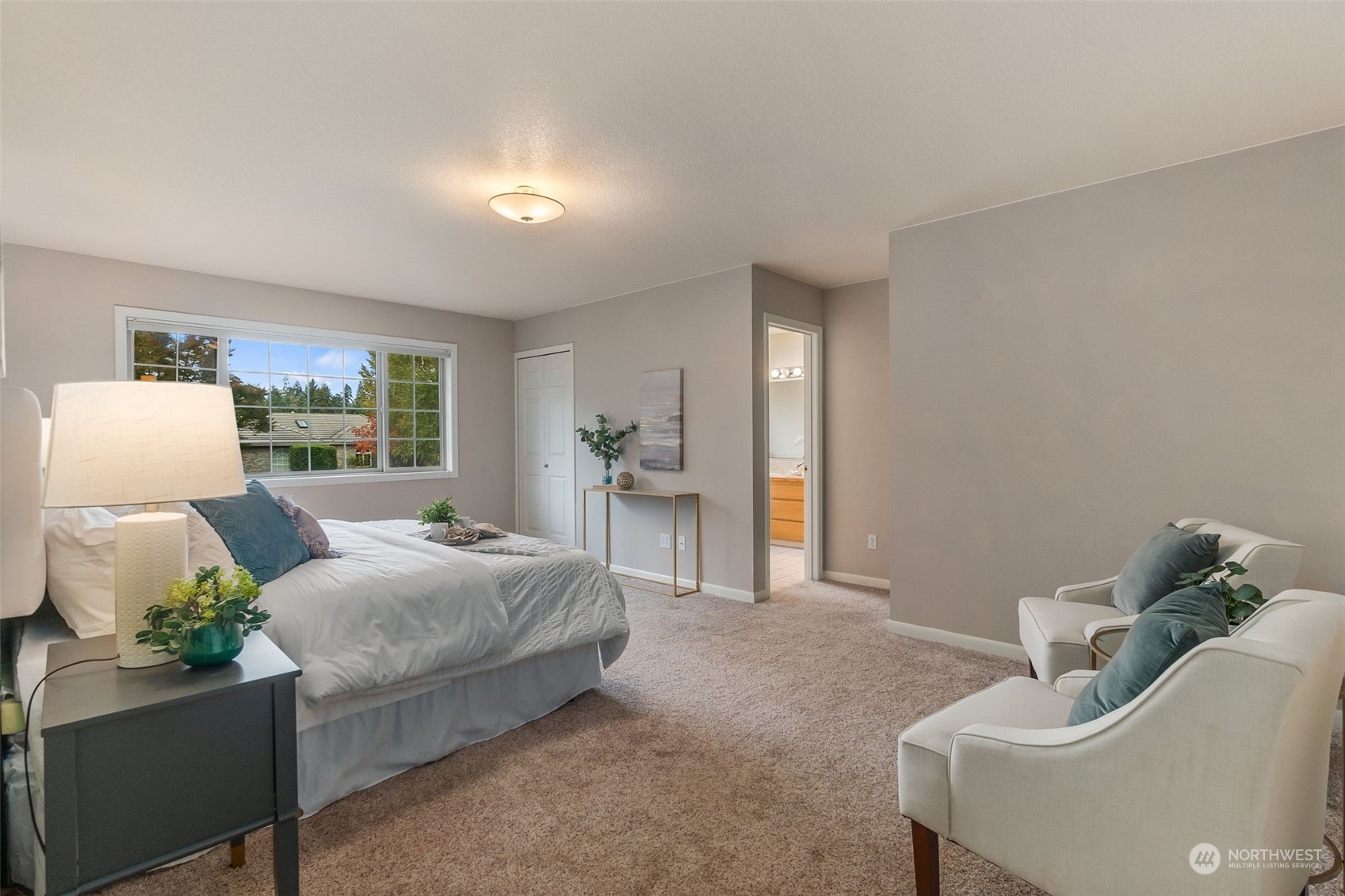 8019 68th Loop Southeast Olympia, WA 98513 - Photo 31 of 40 a bedroom with a bed and window