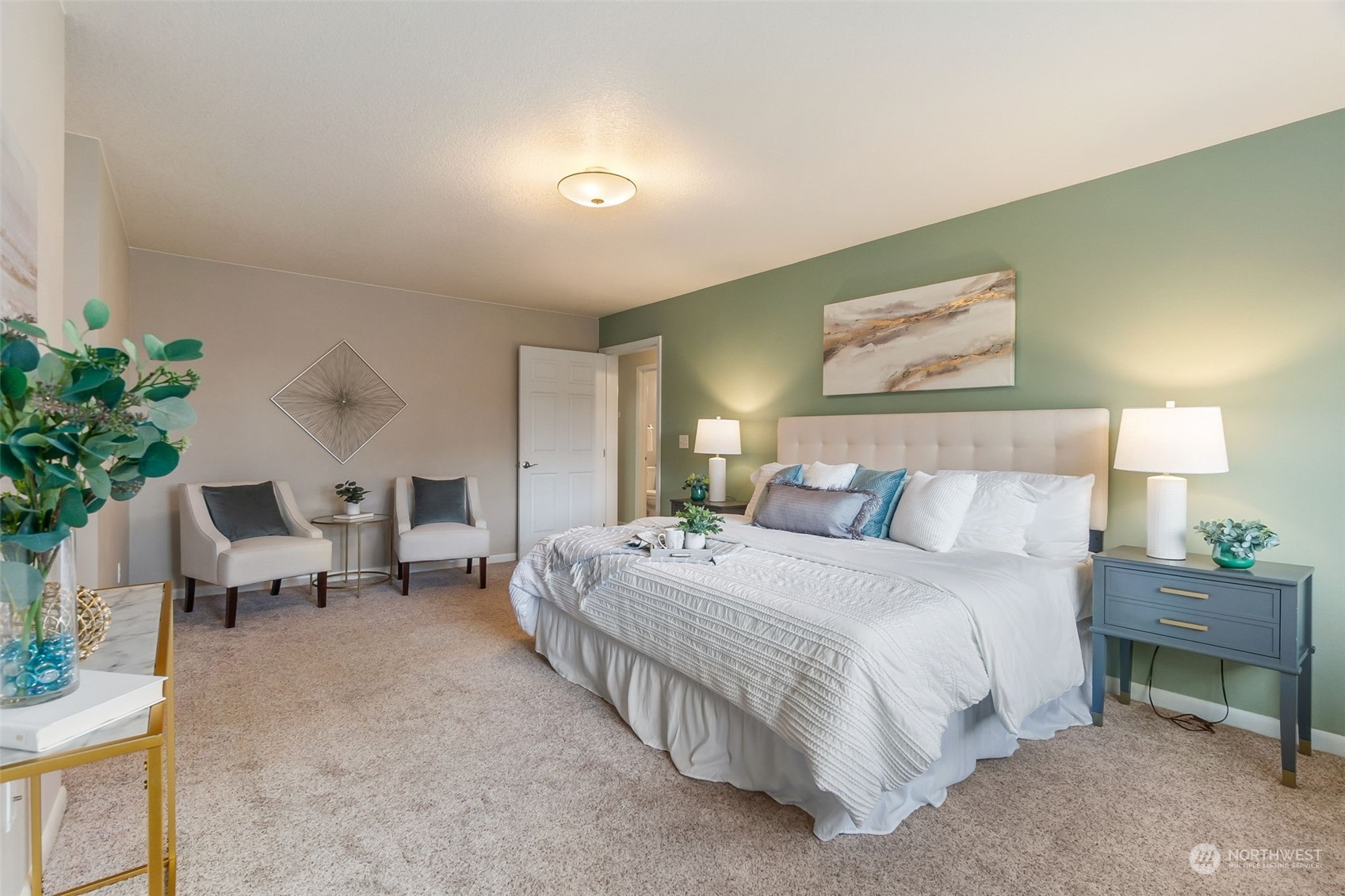8019 68th Loop Southeast Olympia, WA 98513 - Photo 34 of 40 a spacious bedroom with a bed and a couch
