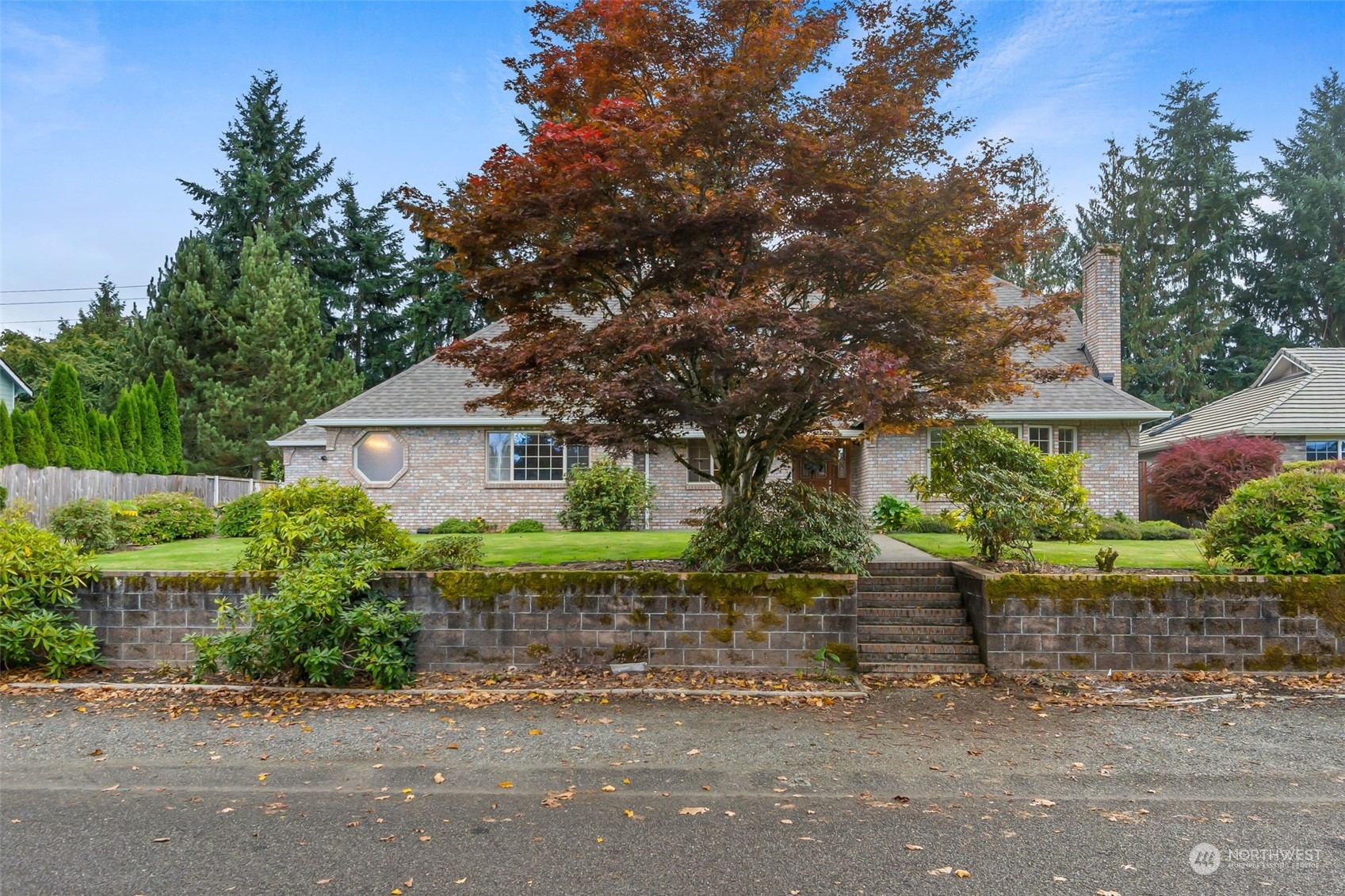 8019 68th Loop Southeast Olympia, WA 98513 - Photo 4 of 40 front view of a house with a street