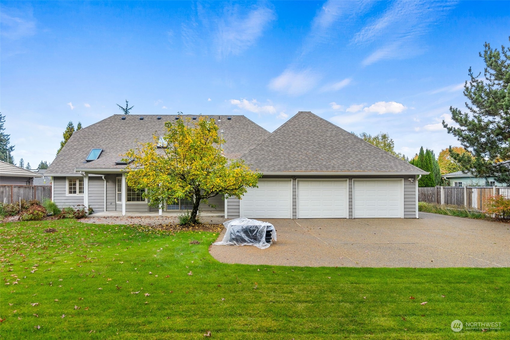 8019 68th Loop Southeast Olympia, WA 98513 - Photo 10 of 40 a front view of a house with a yard