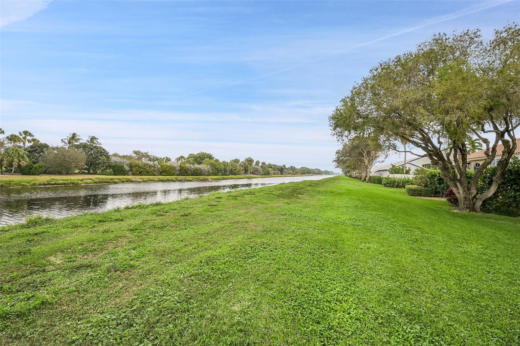 17210 Boca Club Boulevard, Unit 103 Boca Raton, FL 33487 - Photo 30 of 33 Canal view from backyard.