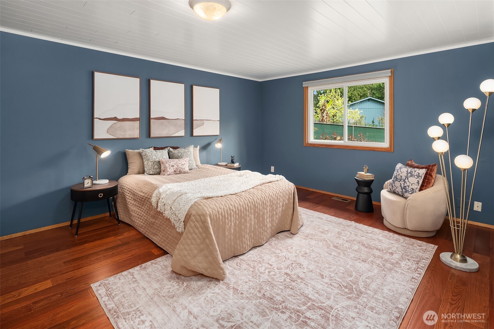 19047 87th Place Southwest Vashon, WA 98070 - Photo 13 of 23 a bedroom with a bed and window