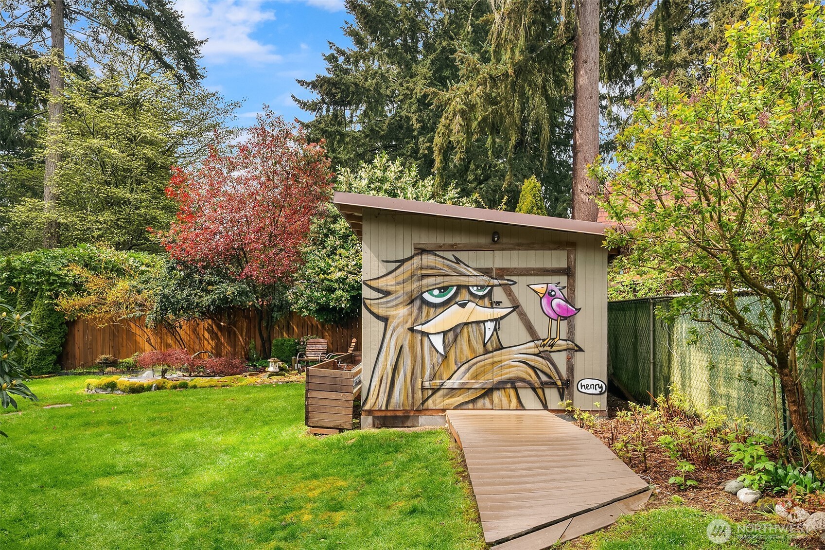19047 87th Place Southwest Vashon, WA 98070 - Photo 22 of 23 front view of a house with a yard