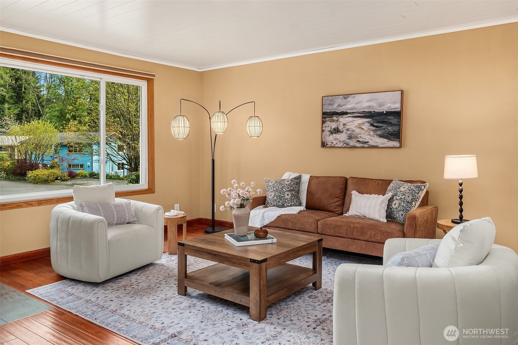 19047 87th Place Southwest Vashon, WA 98070 - Photo 6 of 23 a living room with furniture and a large window