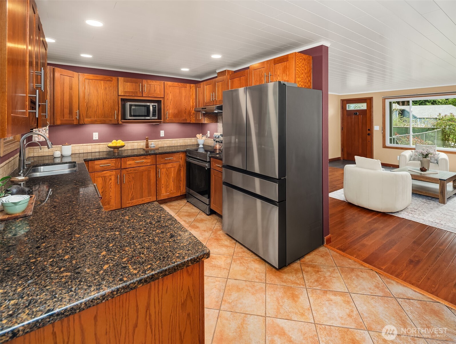 19047 87th Place Southwest Vashon, WA 98070 - Photo 7 of 23 a kitchen with stainless steel appliances granite countertop a refrigerator oven a sink and dishwasher