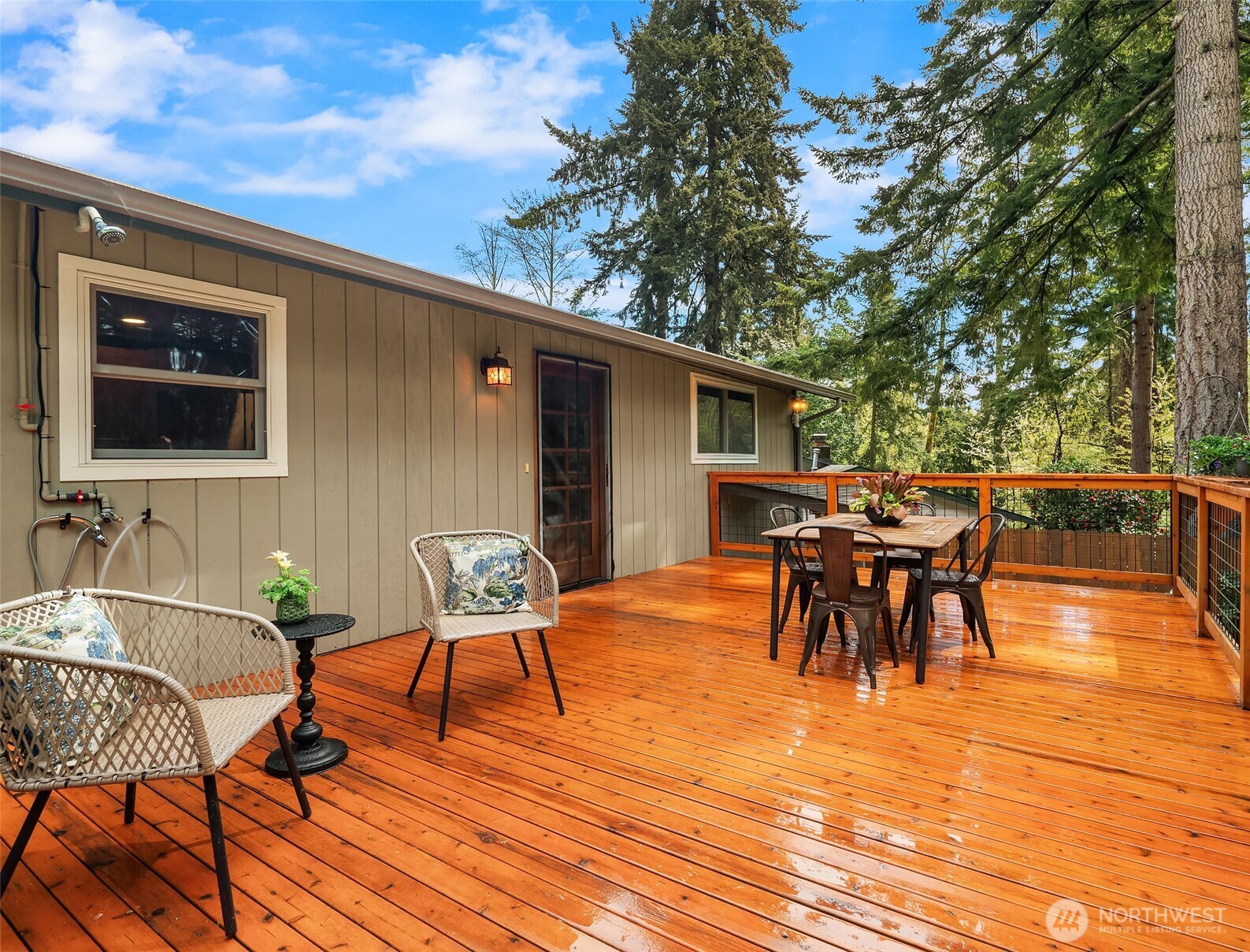 19047 87th Place Southwest Vashon, WA 98070 - Photo 10 of 23 a patio with table and chairs