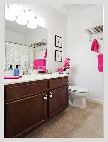 a view of room with window and wooden floor