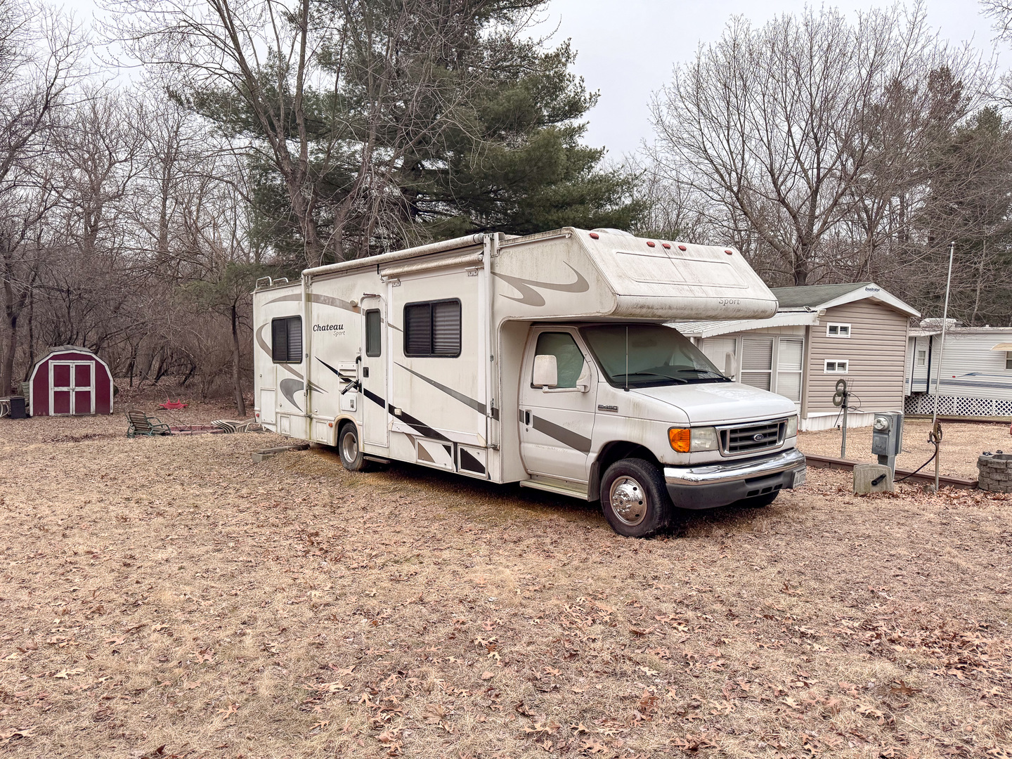 21-70 Woodhaven Sublette, IL 61367 - Photo 1 of 15 a view of a cars parked in front of a house