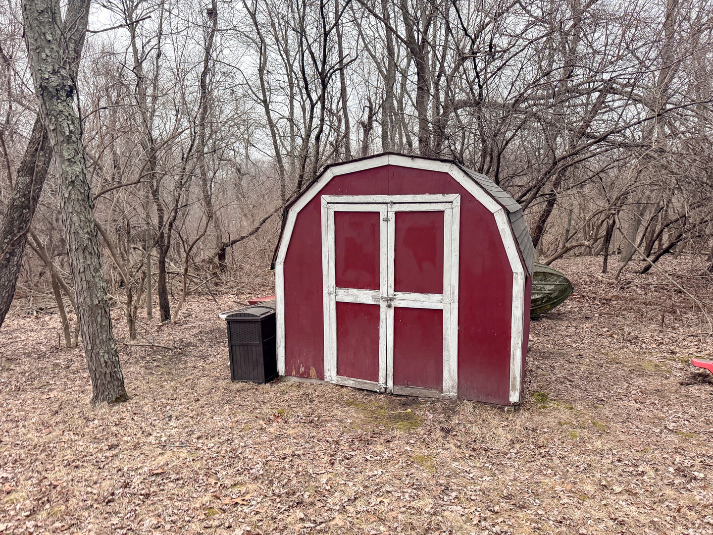 21-70 Woodhaven Sublette, IL 61367 - Photo 2 of 15 a view of a wooden house with large trees