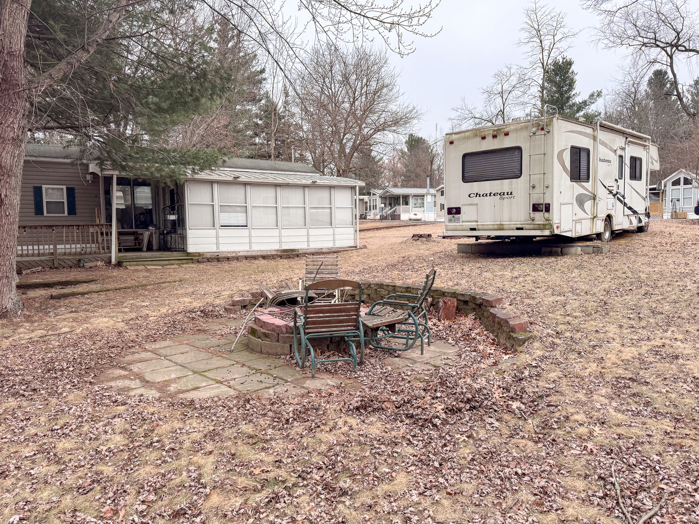 21-70 Woodhaven Sublette, IL 61367 - Photo 5 of 15 a view of a backyard with table and chairs