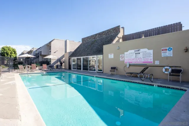 a view of a house with a swimming pool
