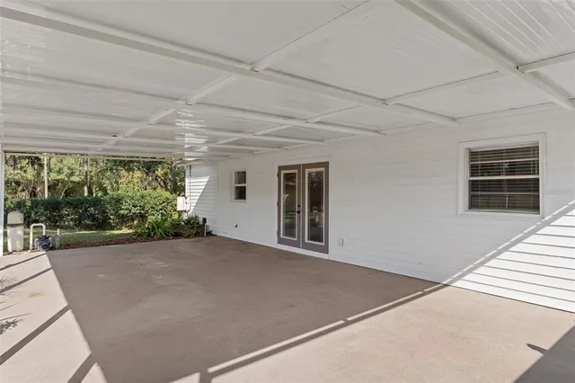 a view of a room with a large window