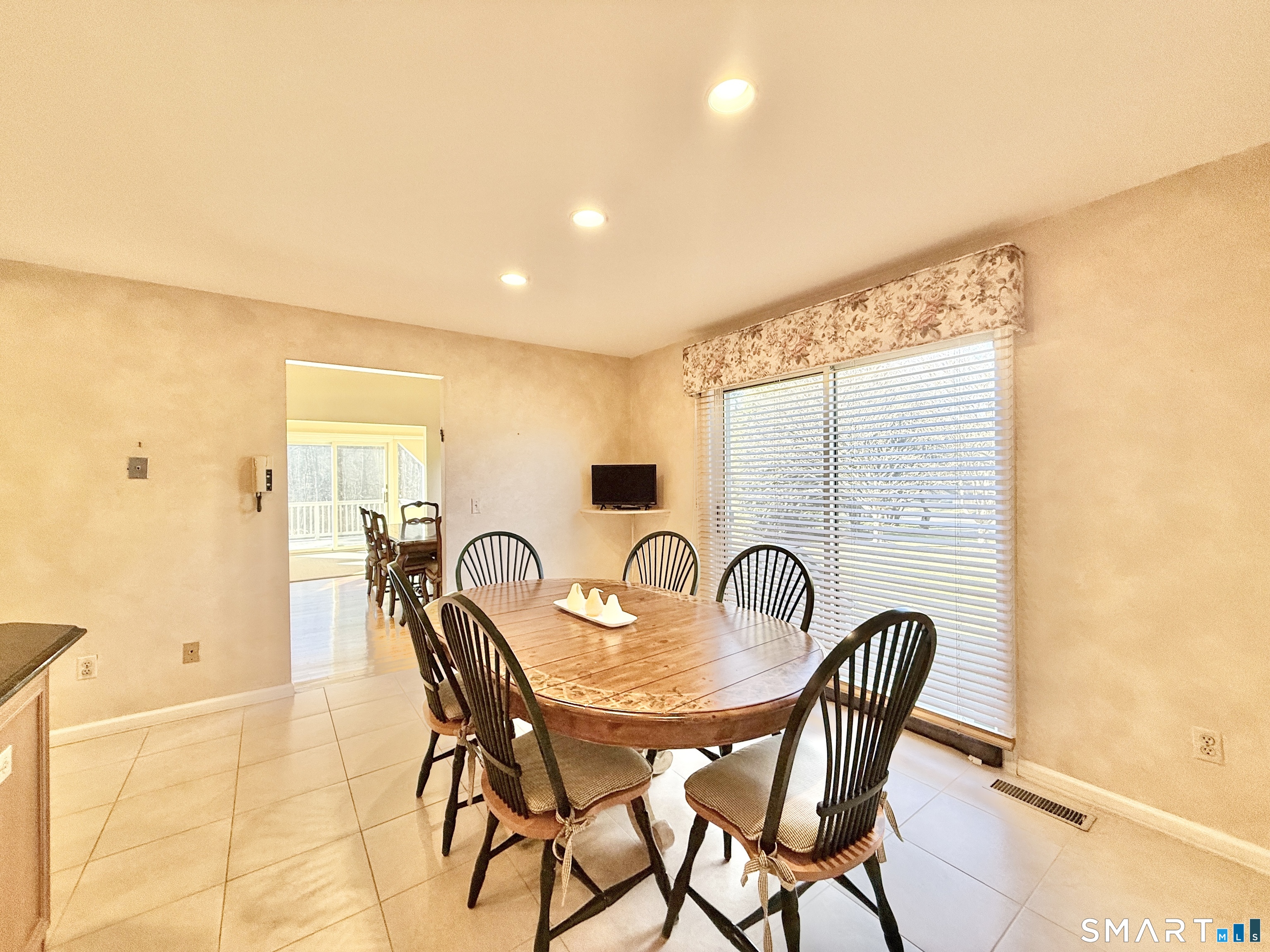 1 Alfred Lane Stamford, CT 06902 - Photo 20 of 35 a dining room with furniture and wooden floor