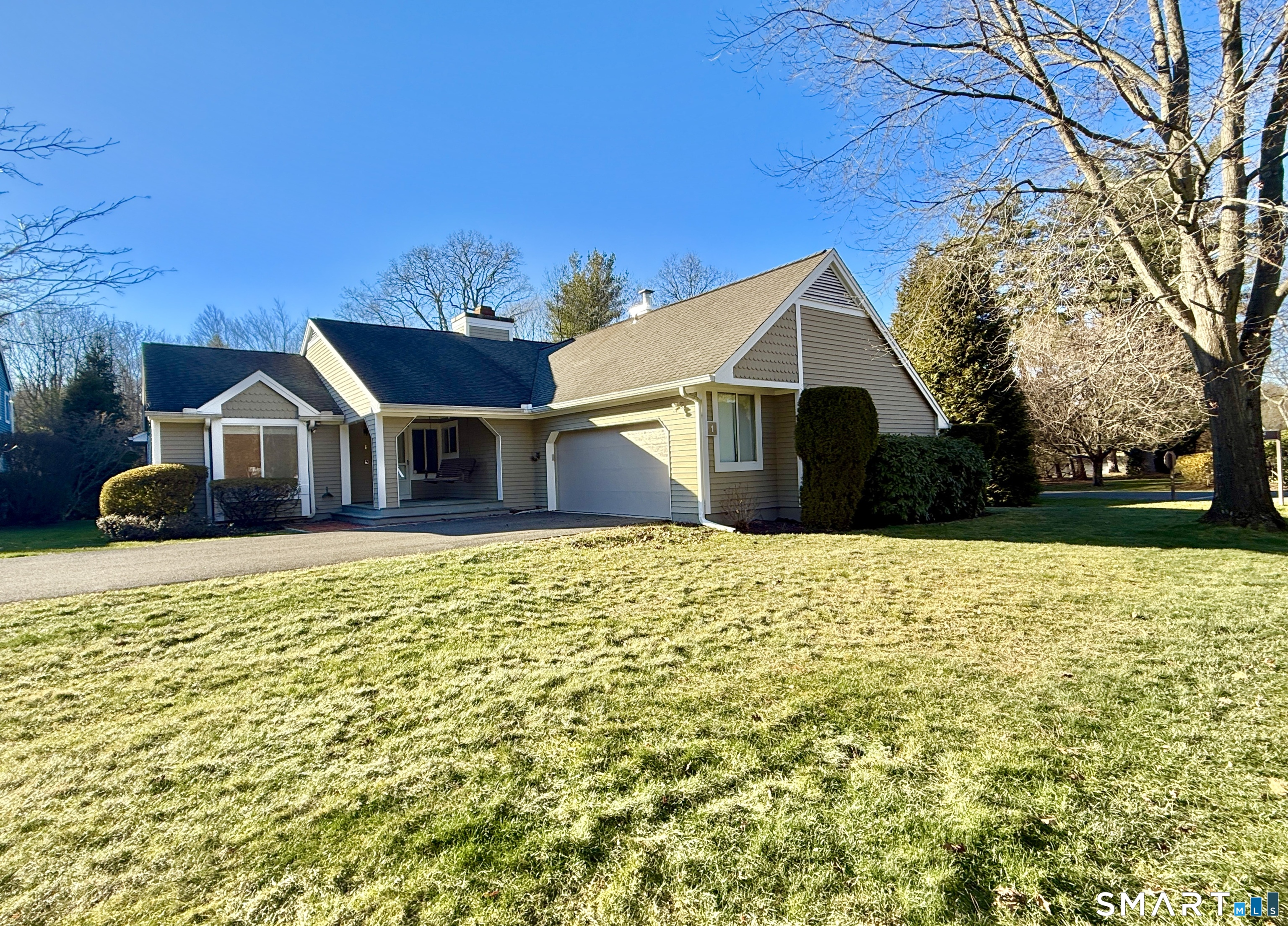 1 Alfred Lane Stamford, CT 06902 - Photo 2 of 35 a front view of a house with a yard