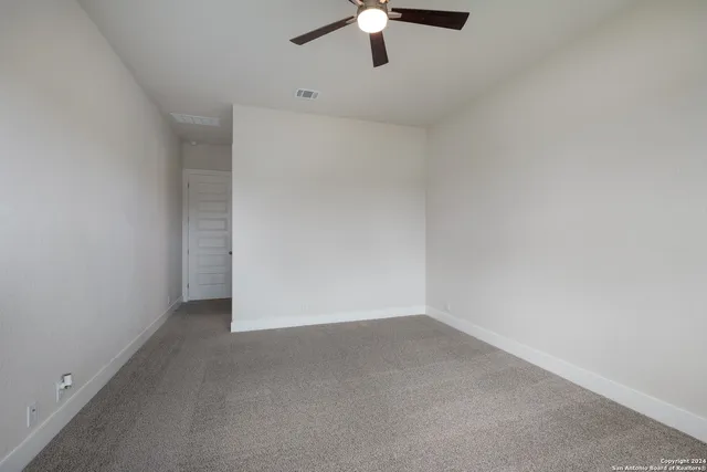 a bathroom with a bathtub and a sink