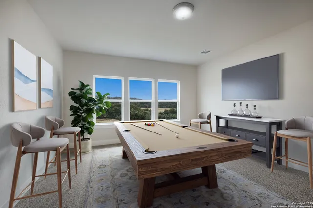 a view of a dining room with furniture