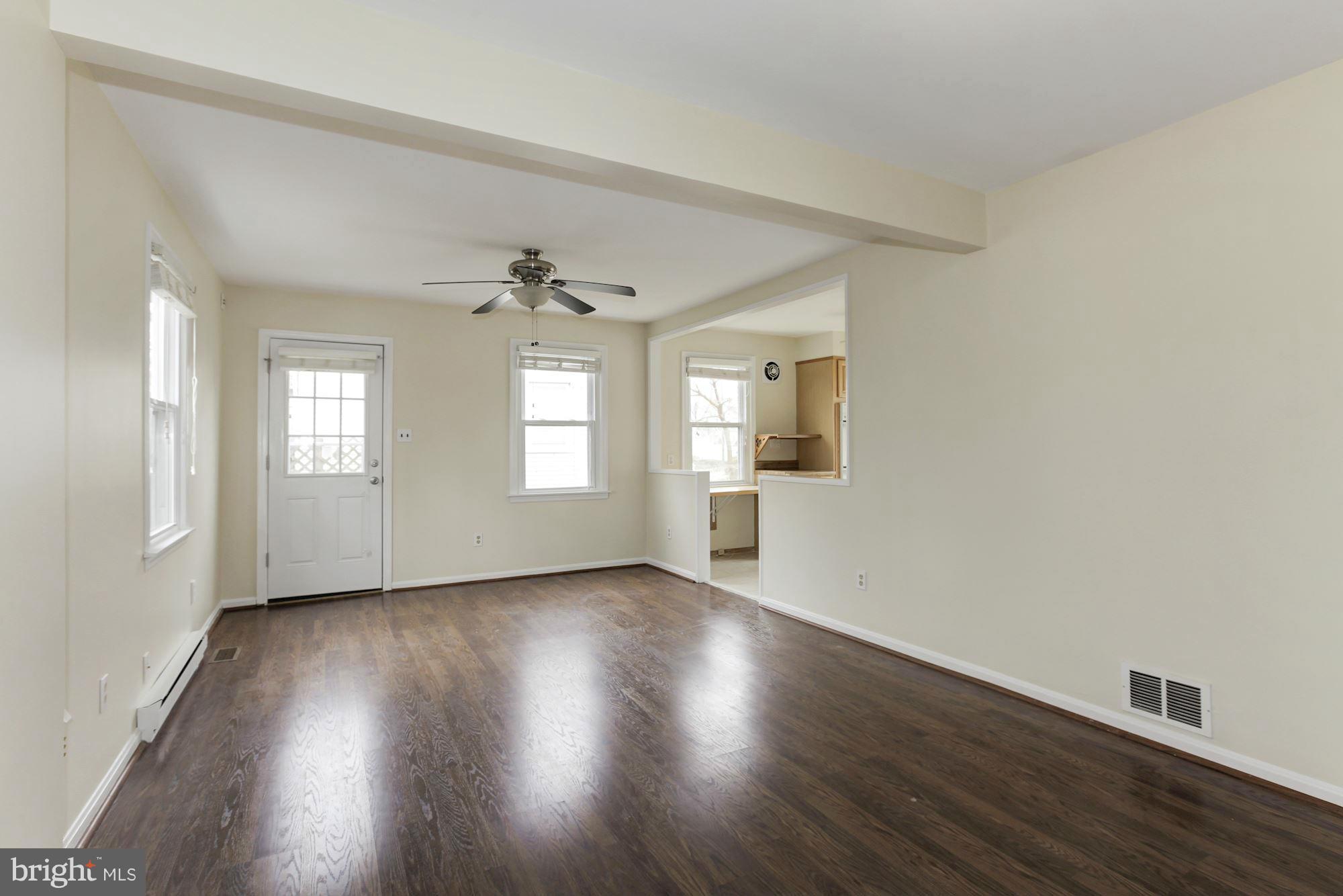 2515 Mason Street Silver Spring, MD 20902 - Photo 8 of 30 an empty room with wooden floor and windows