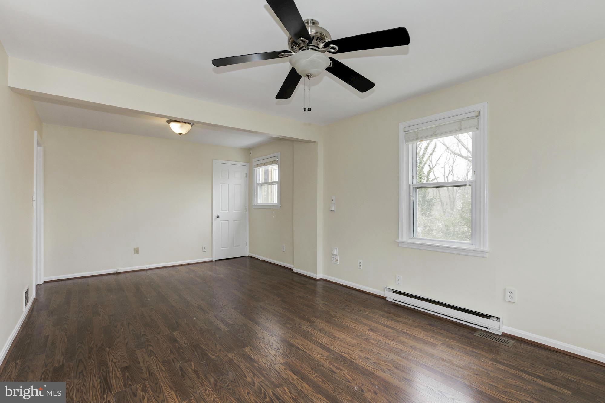 2515 Mason Street Silver Spring, MD 20902 - Photo 10 of 30 wooden floor in an empty room with a window